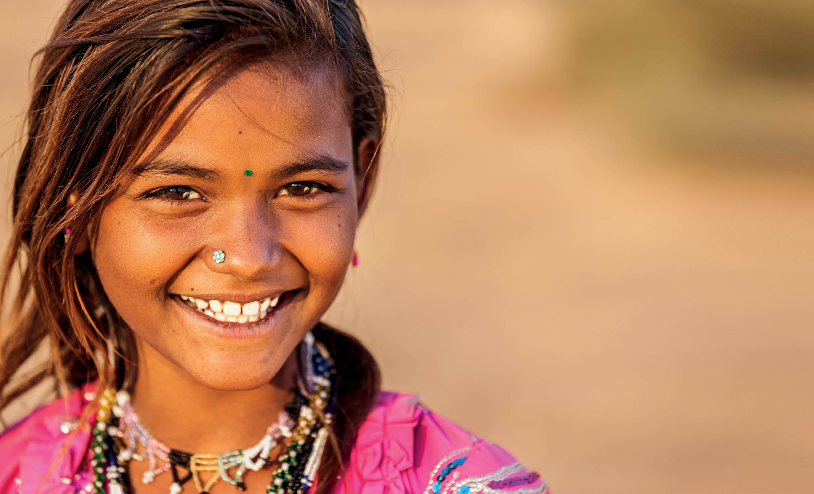 Happy Gypsy Indian girl from desert village  Thar Desert  Rajasthan  India http   bem 2be pl IS rajasthan_380 jpg